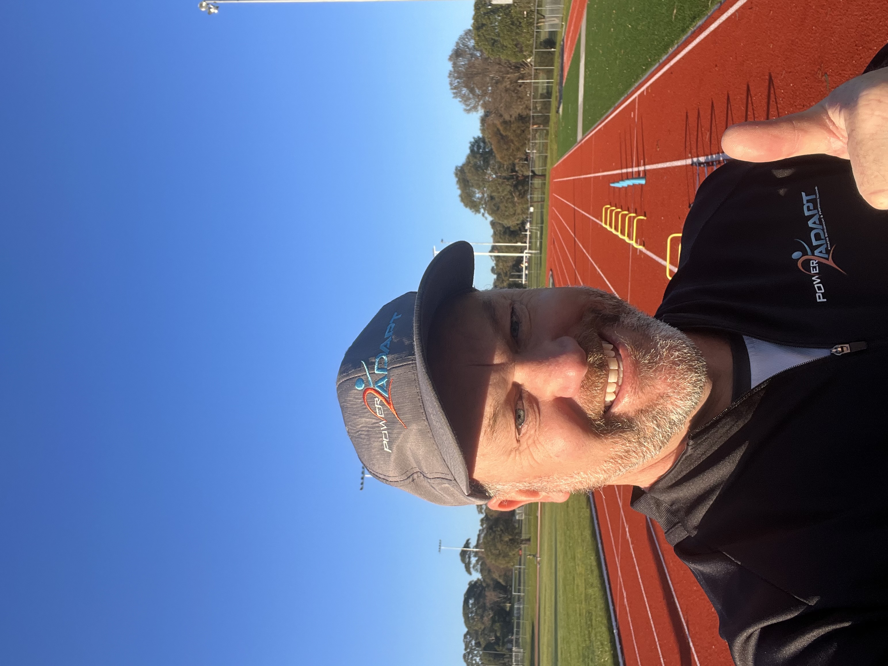 Coach Alistair Tait on the track